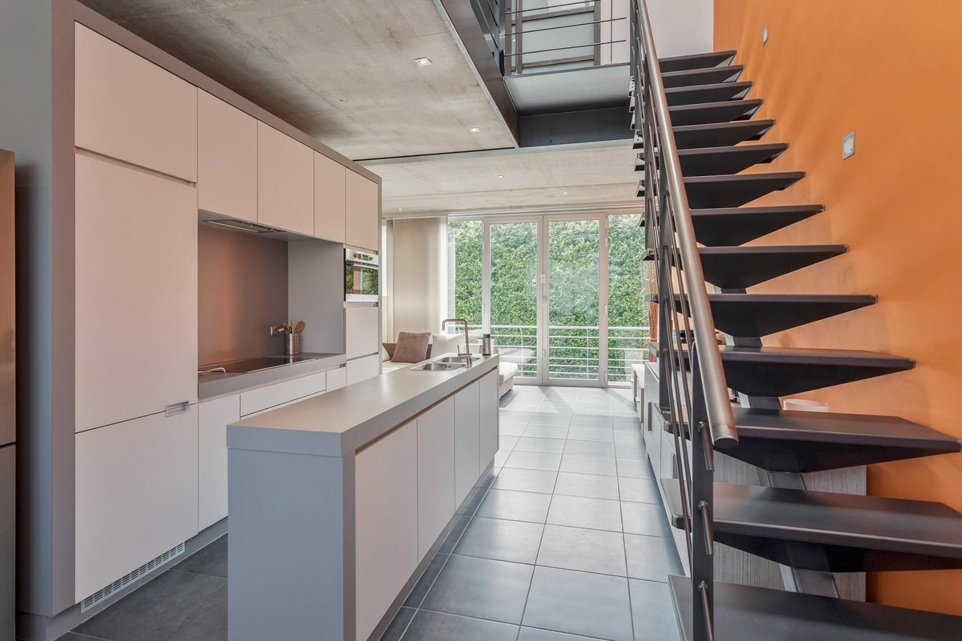 Dilbeek centrum: duplex appartement met 2 slaapkamers en tuintje foto 4