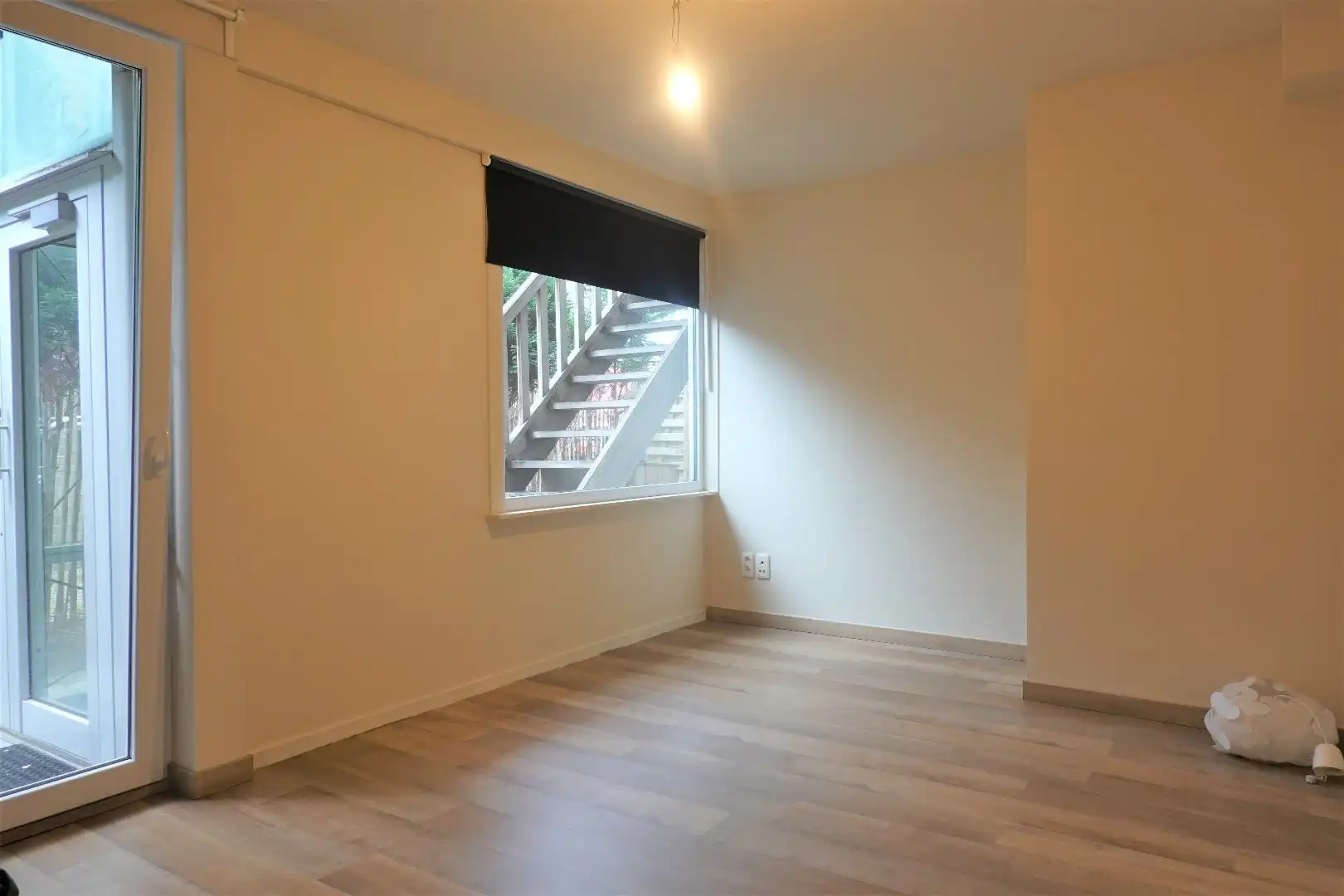 Ruim gelijkvloers appartement met koertje  foto 11