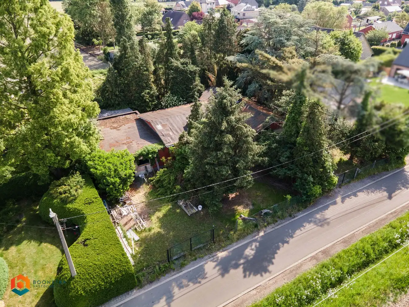 Te renoveren woning met 3 slpkrs op projectgrond van 2178m² in Heist-op-den-Berg foto 3