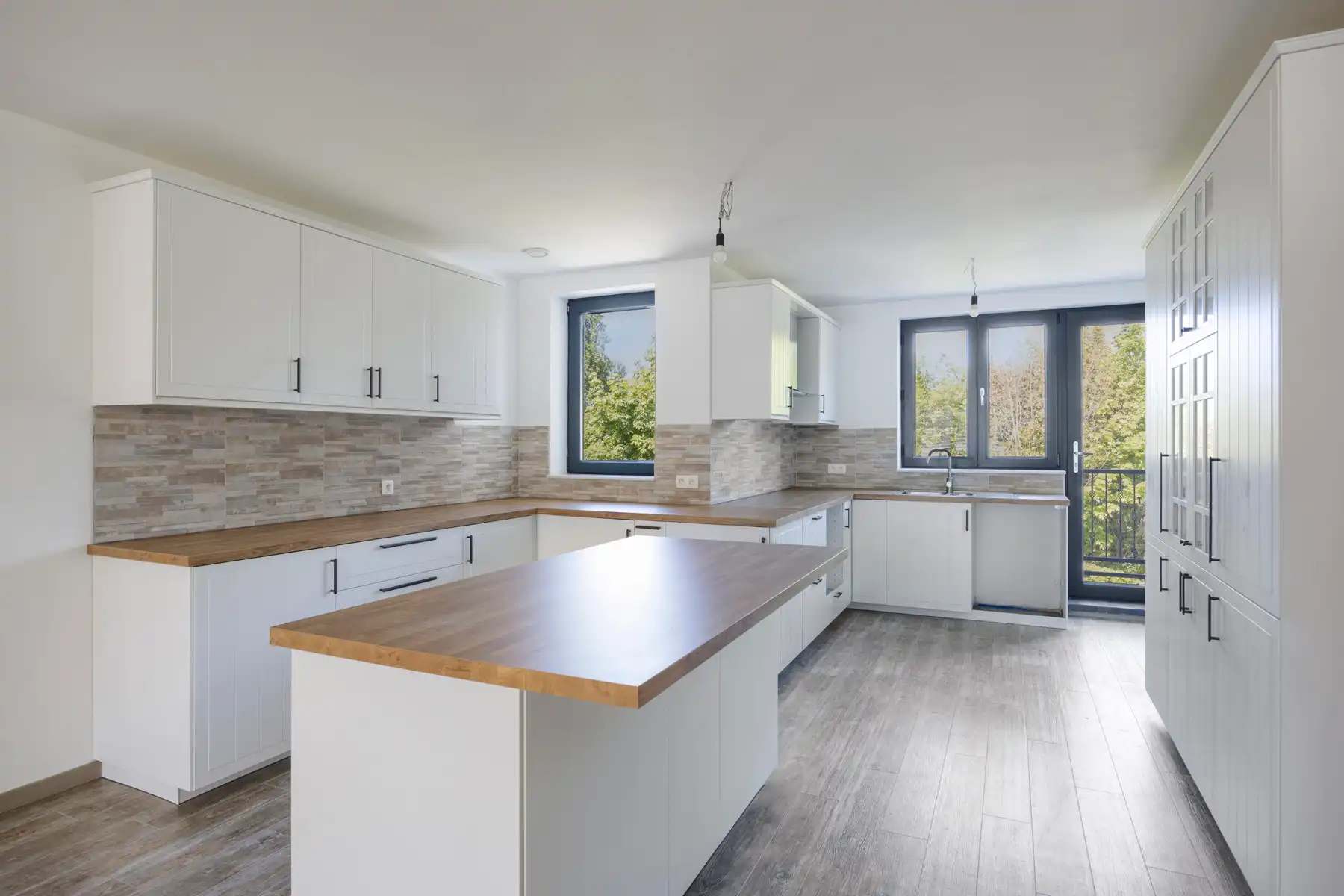 Nieuwbouw triplex met 4 slaap- en badkamers, tuin en parking foto 5