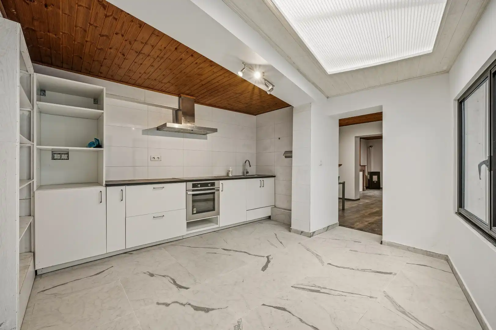 Gezellige rijwoning met 3 slpks op de Tiense stadsrand foto 3