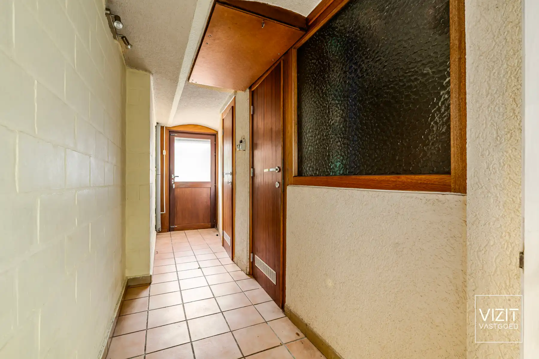 Halfopen woning met tuin en garage foto 17