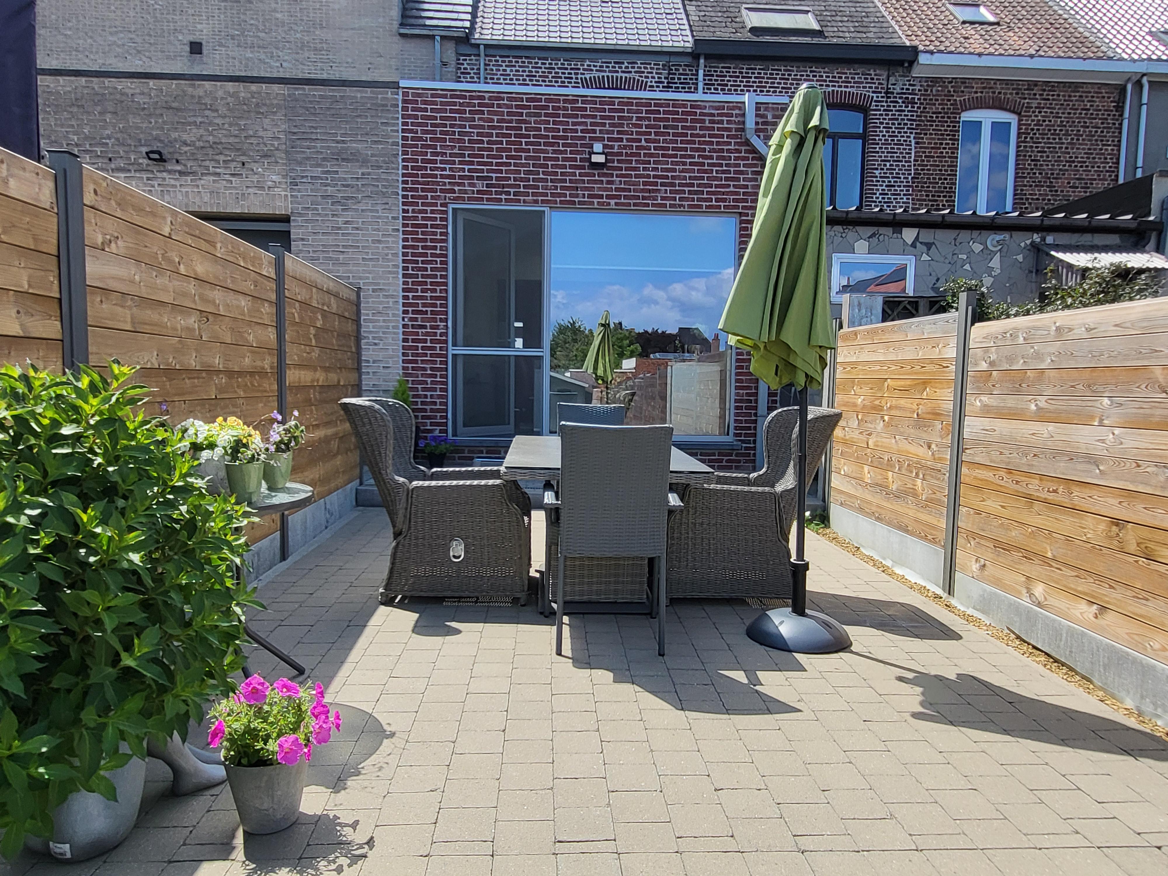 Prachtig onderhouden woning met zonnig tuintje en terras. foto 26