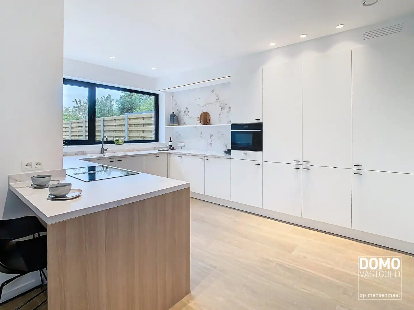 Ruim wonen in Kermt in een volledig gerenoveerde gezinswoning foto 6