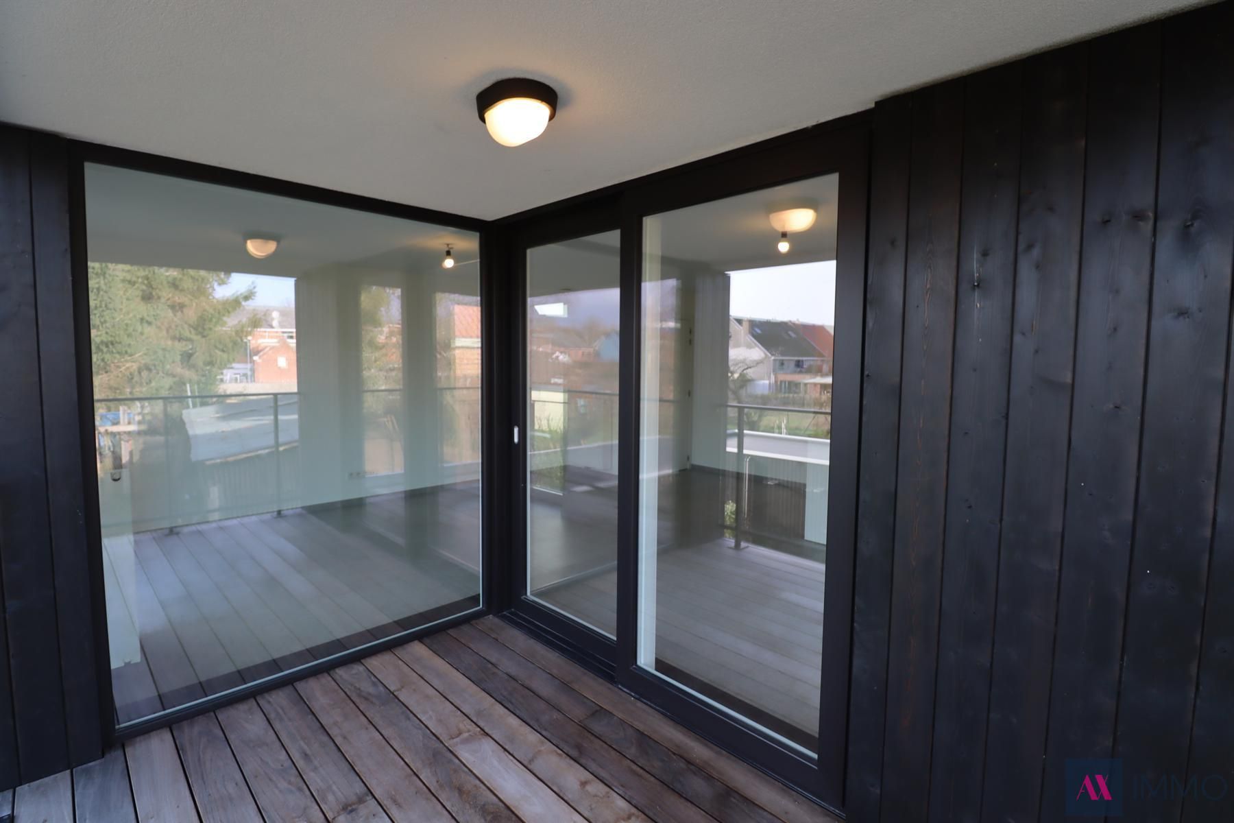 Recent 2 slpk-appt. met terras en autostaanplaats foto 11