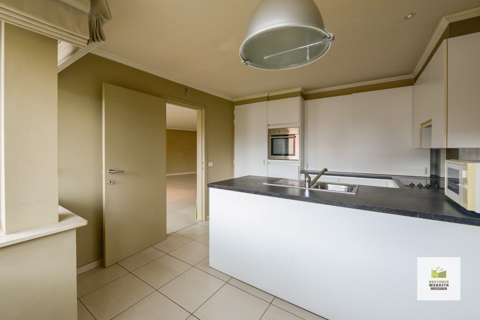 Ruim appartement met 2 slaapkamers, terras en garage in centrum Wingene foto 9
