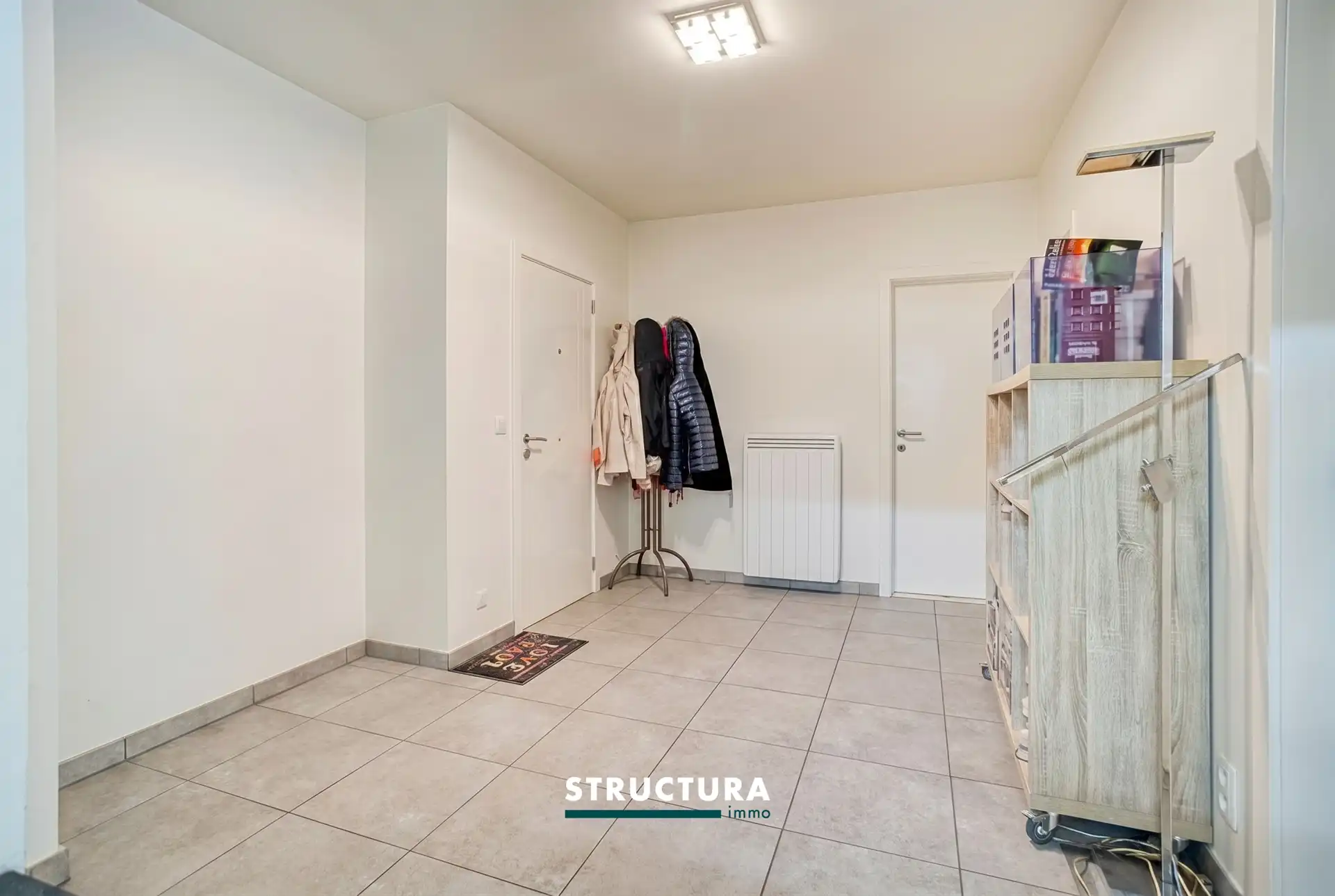 Ruim, gelijkvloers rappartement met parkeerplaats foto 2