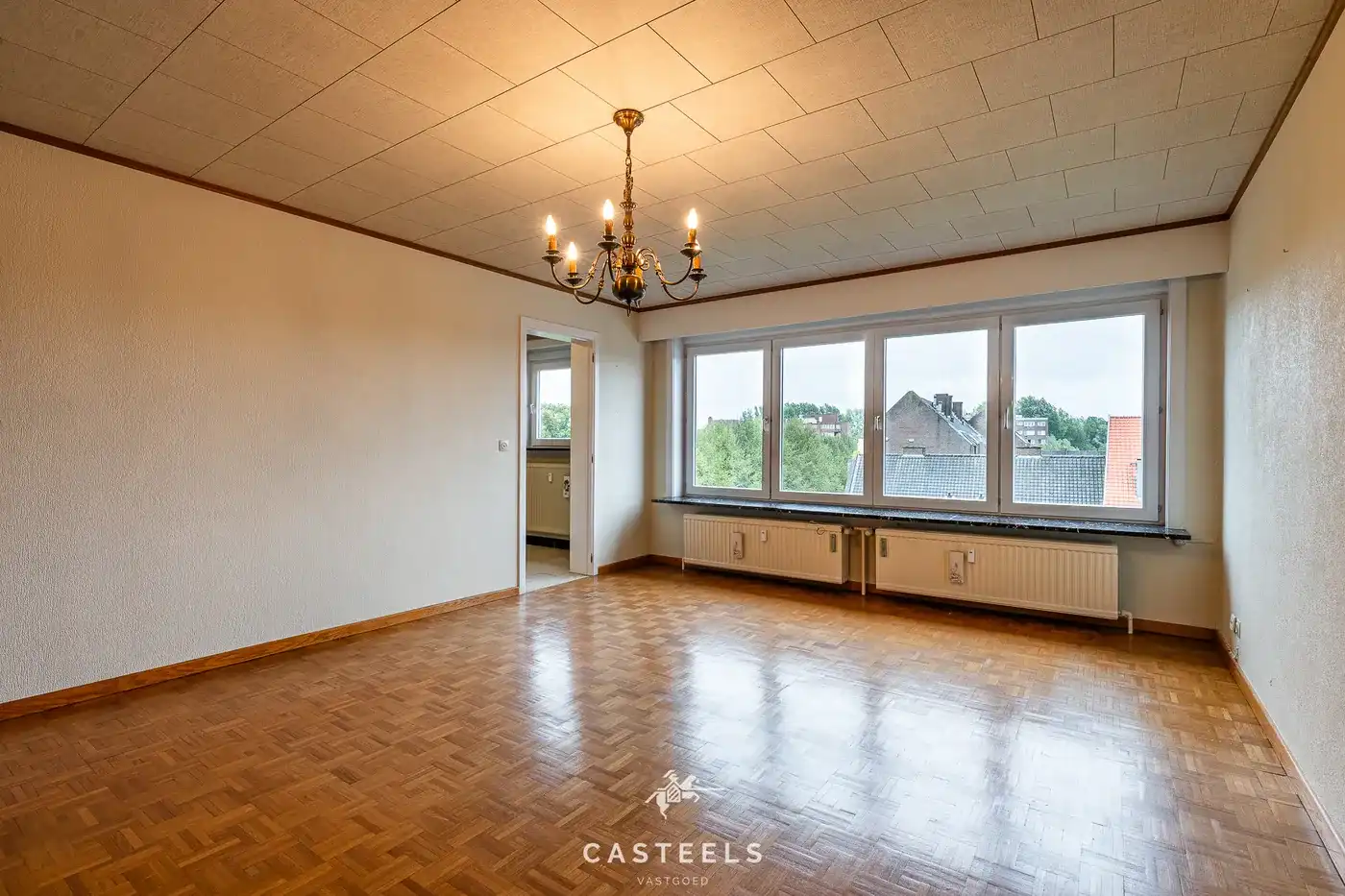Ruim, te renoveren EPC B appartement met twee slpkmrs te Gent foto 4