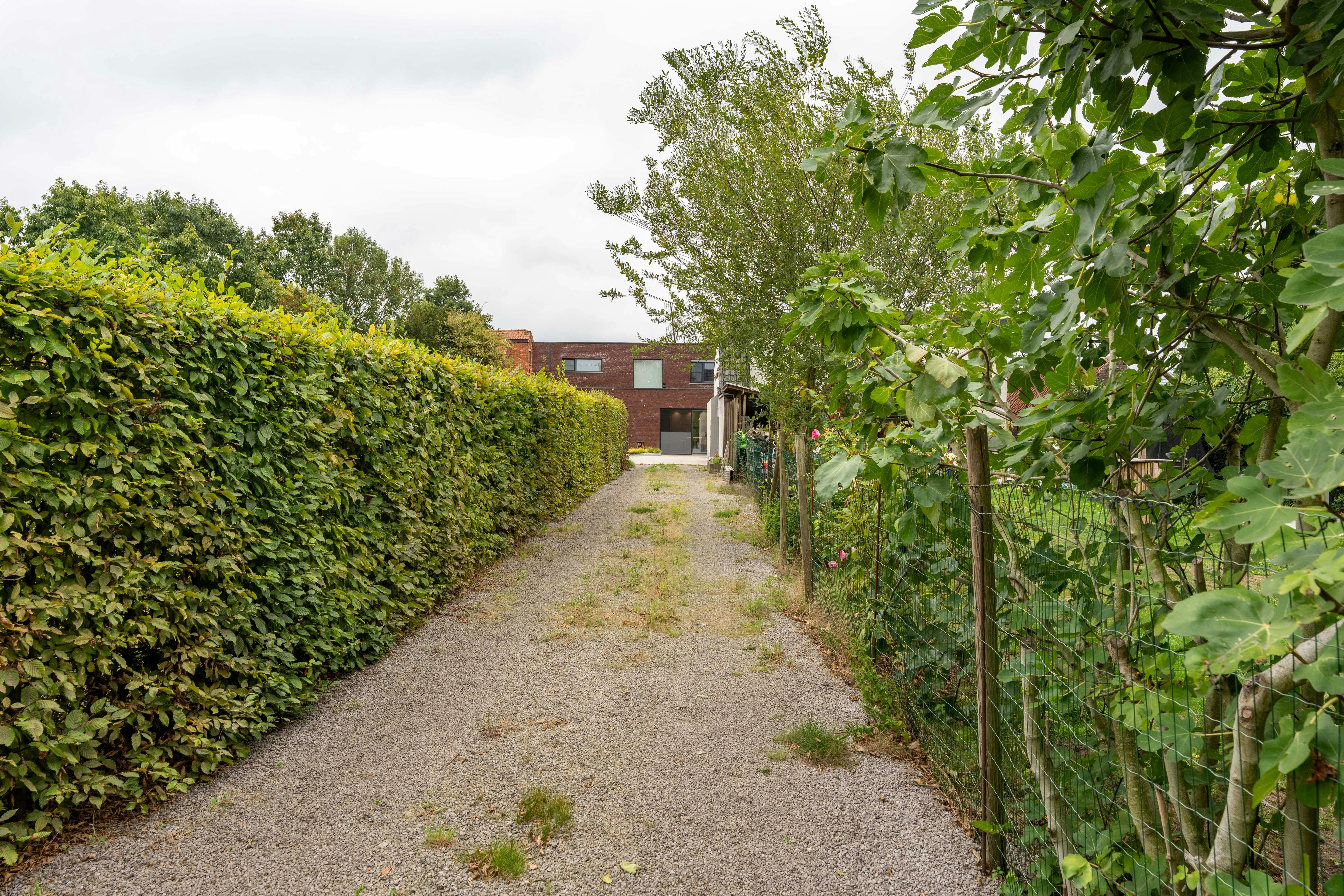 Moderne villa met atelier en parking te koop in Evergem foto 26