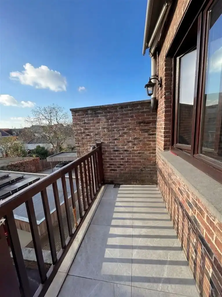 Gezellig appartement met 2 slaapkamers en terrasje nabij het centrum van Maaseik. foto 12