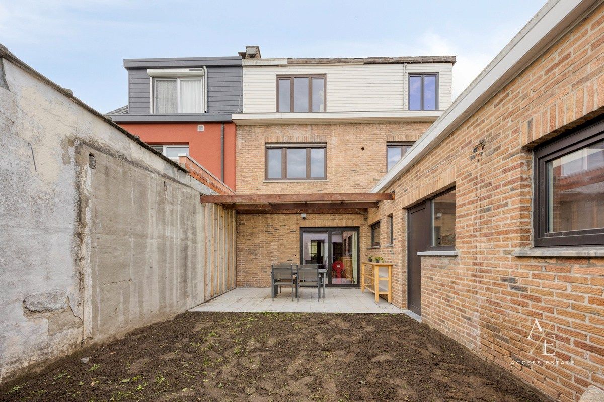 Ruime halfopen woning met potentieel in rustige straat te Melle foto 14