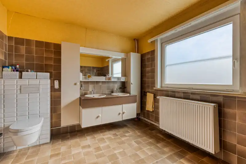 Ruime open bebouwing met potentieel in groene, rustige buurt van Evergem foto 6