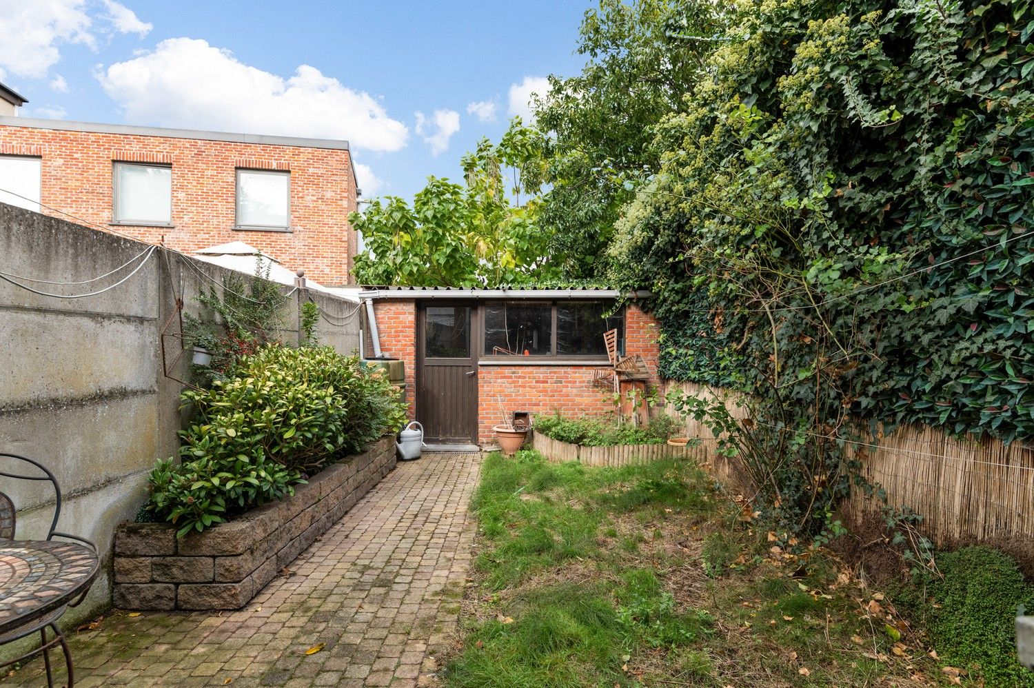 Huis met 3 slaapkamers en tuin te koop in Wijnegem! foto 11