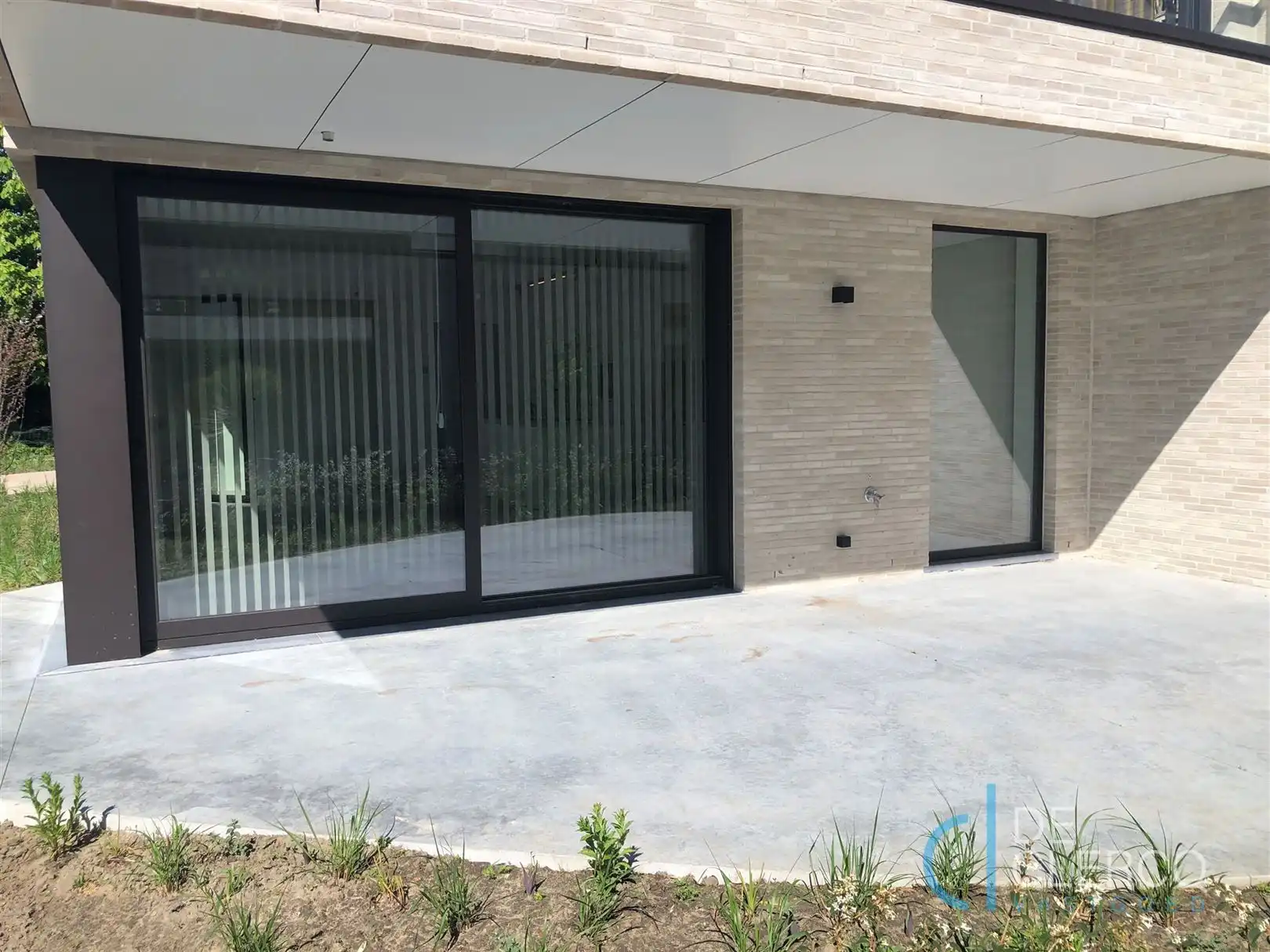 Gloednieuw gelijkvloers appartement in hartje Lochristi! foto 14