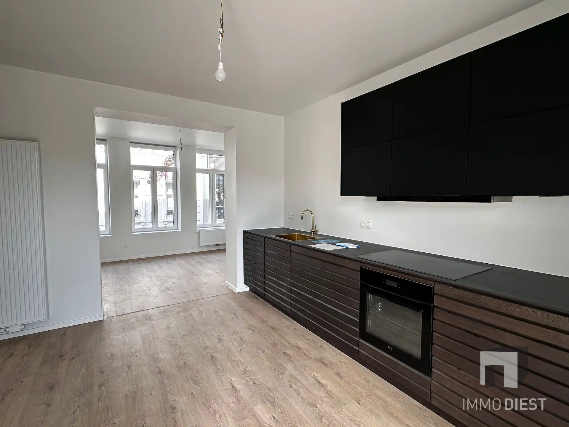 Opbrengsteigendom - 3 gloednieuwe appartementen + 1 handelspand foto 12