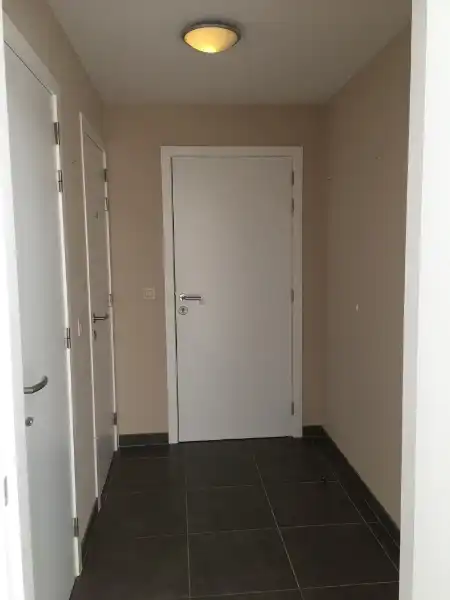 Appartement met twee slaapkamers - ruim terras en garagebox foto 2