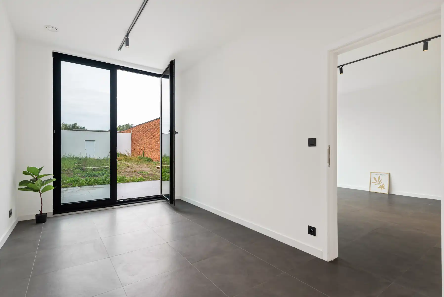 Nieuwbouw gelijkvloers appartement met tuin & garagebox foto 7