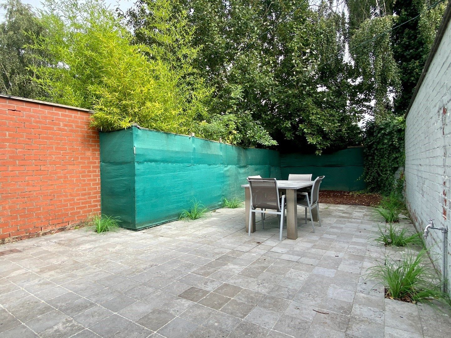Centraal gelegen woonst met handelsruimte en tuin in het centrum van Kuurne. foto 13