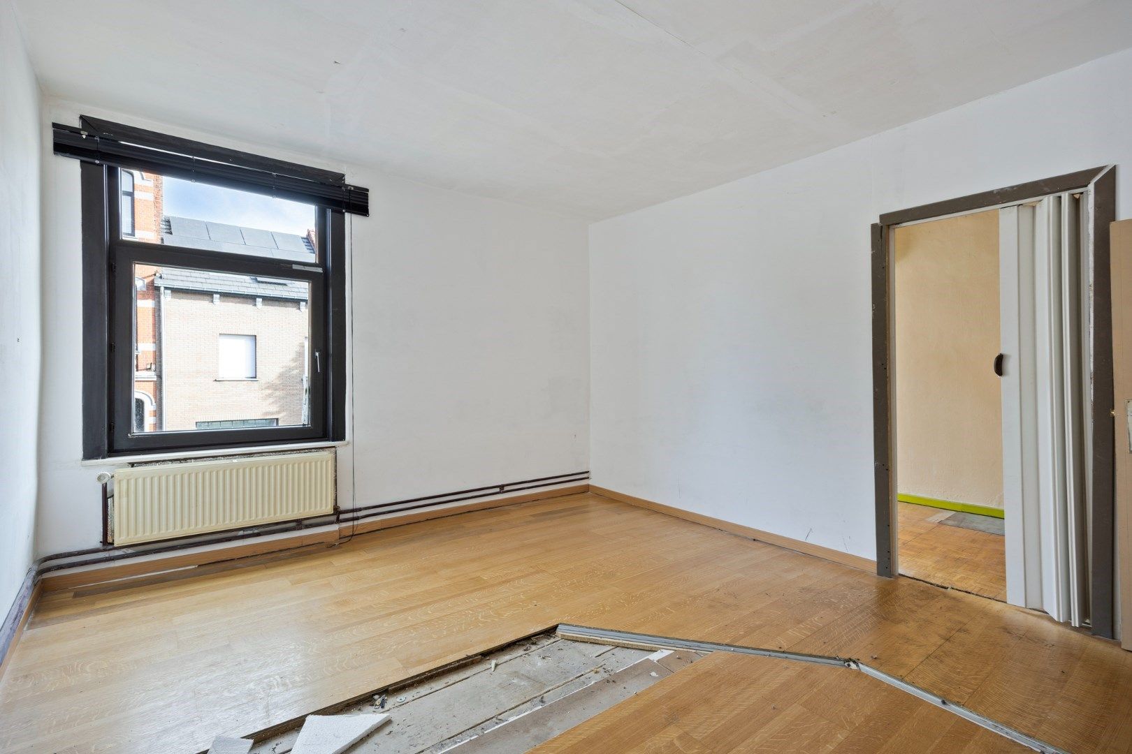 Halfopen hoekwoning met garage en dakterras op toplocatie in Kessel-Lo – renovatieproject met veel potentieel foto 27