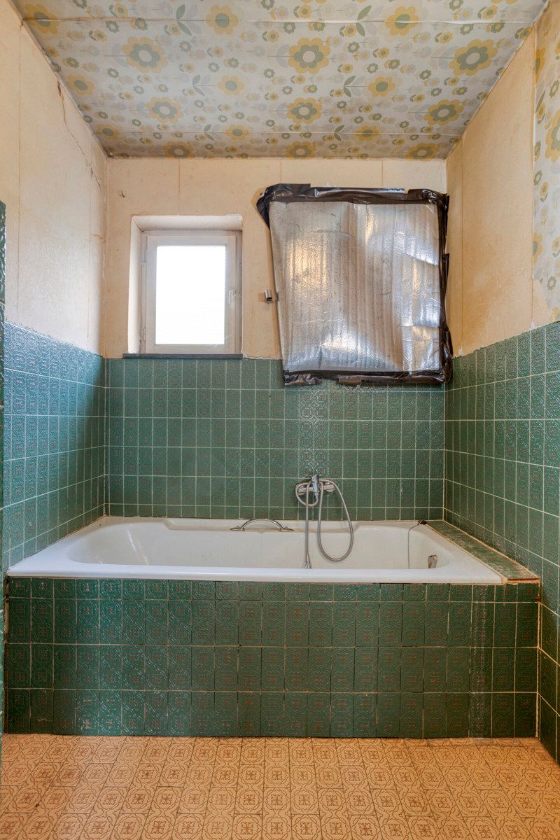 Te renoveren woning met 3 slaapkamers en tuin. foto 17