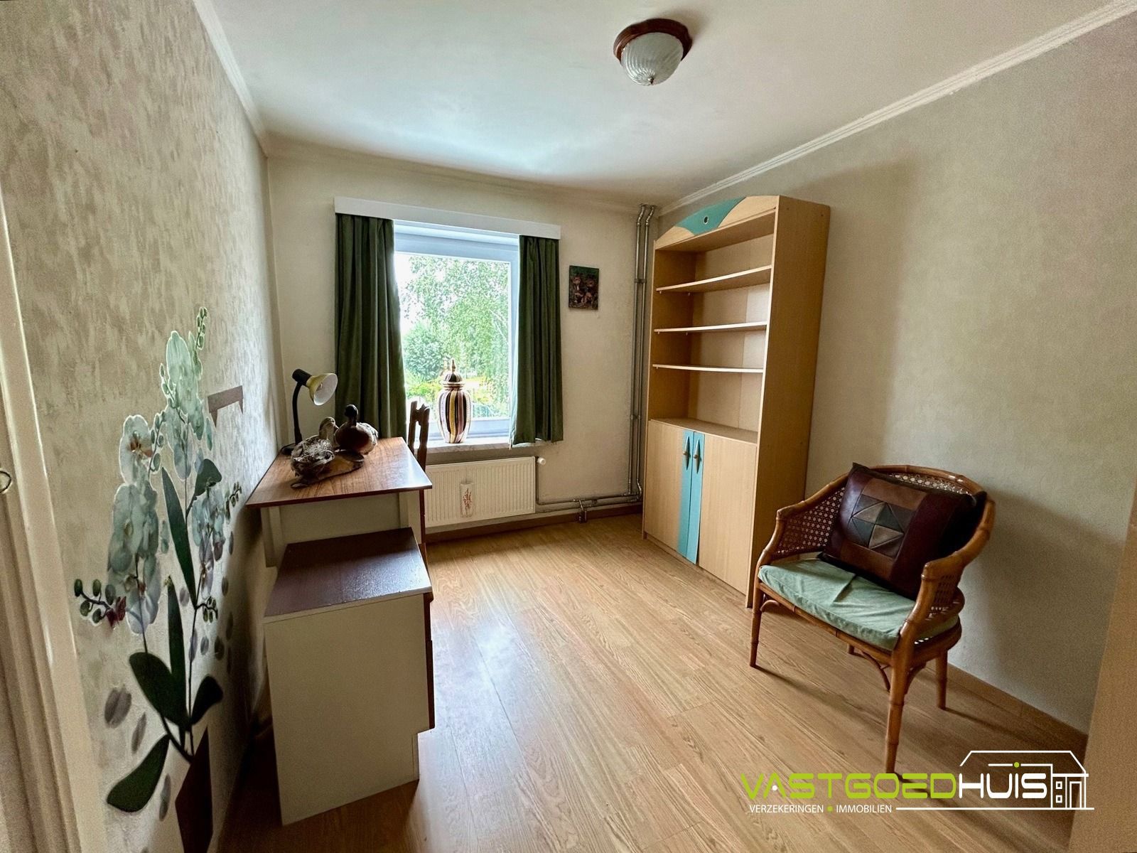 Ruime gezinswoning met garage en tuin foto 12