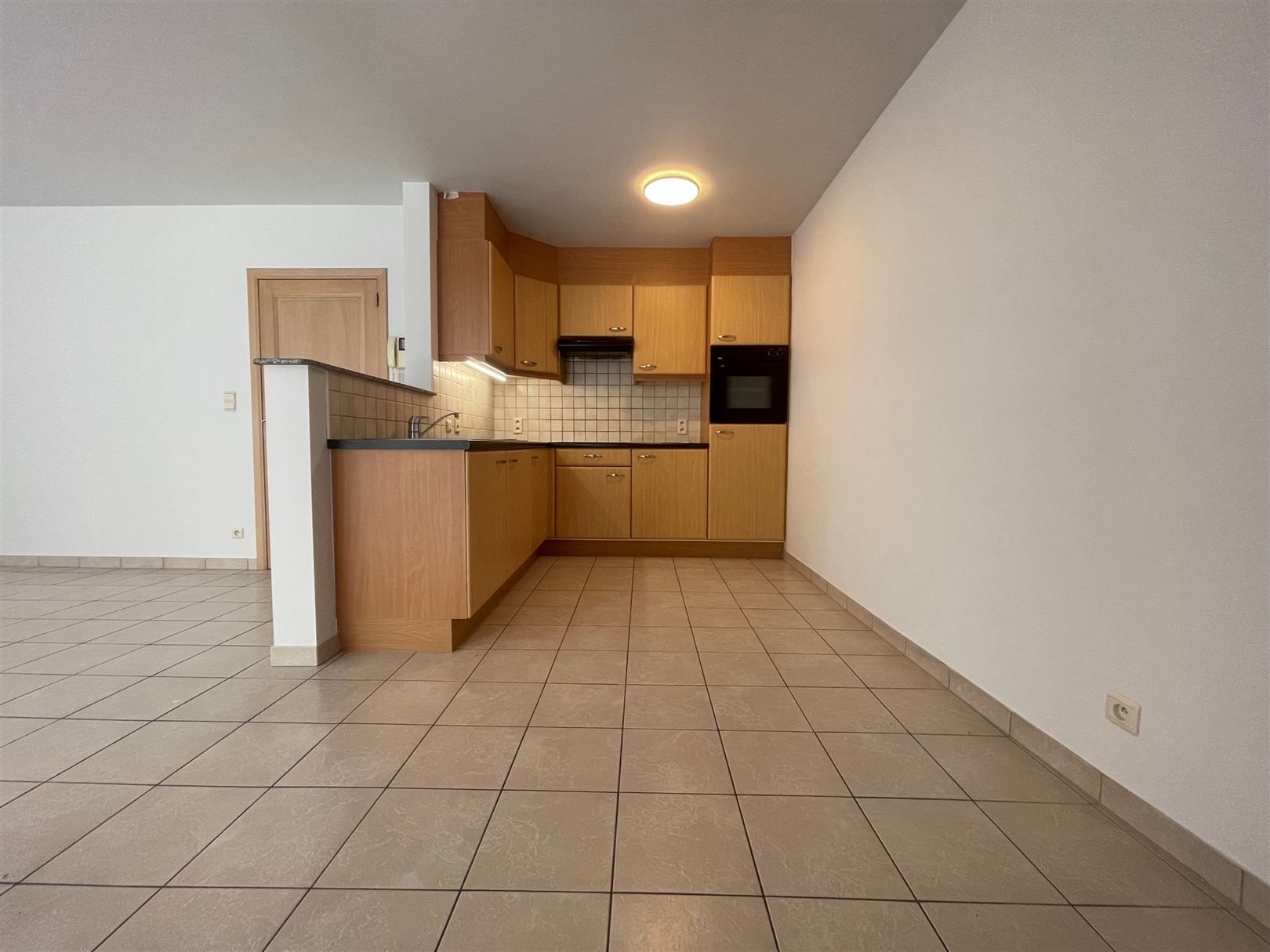 Gelijkvloerse appartement  met afgesloten koer  foto 4