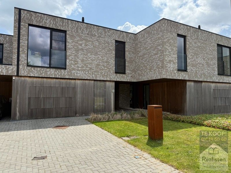 Schakelwoning in hartje Godsheide foto 2