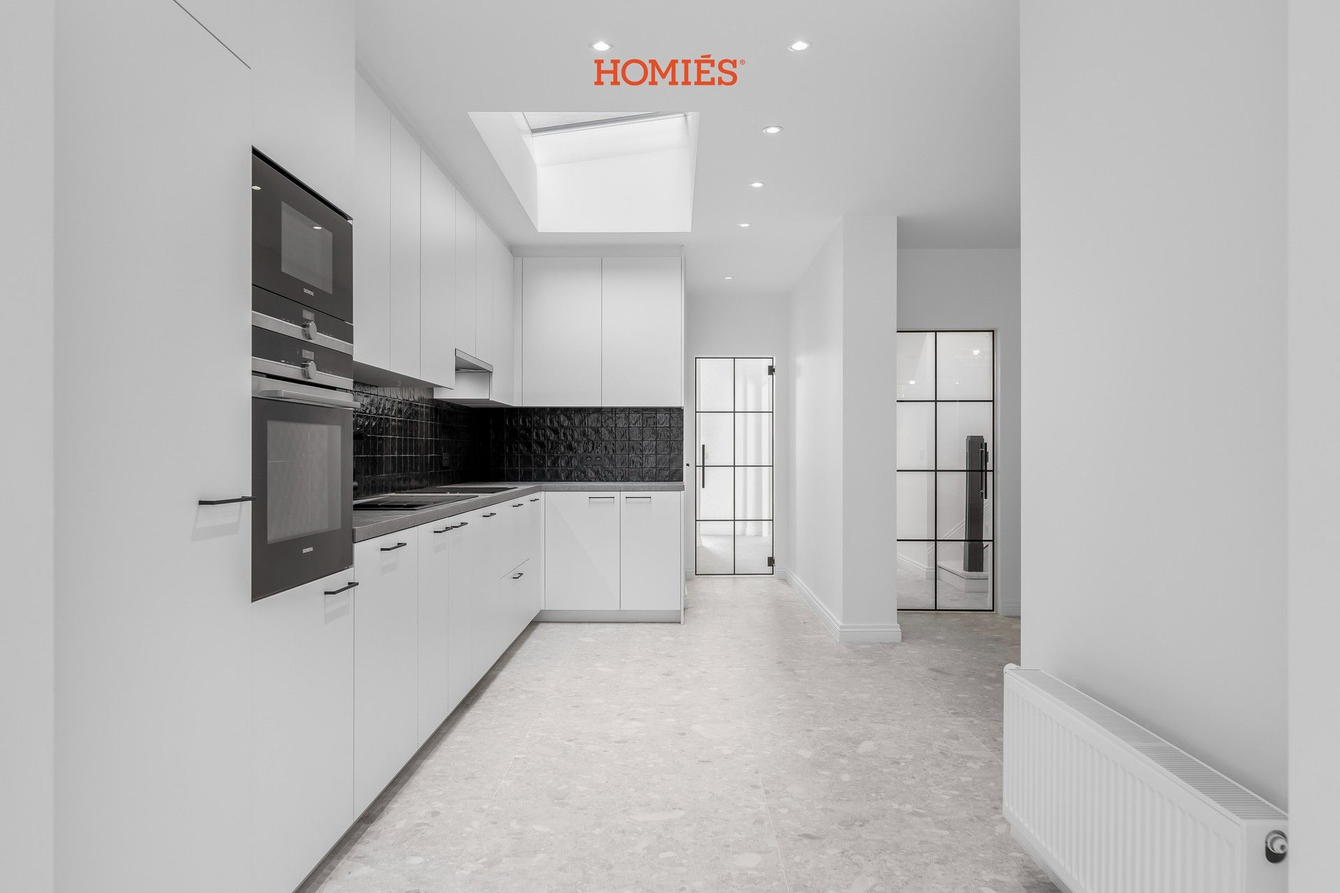 Gerenoveerd herenhuis met 6 slpk, 3 badk in centrum Leuven! foto 2