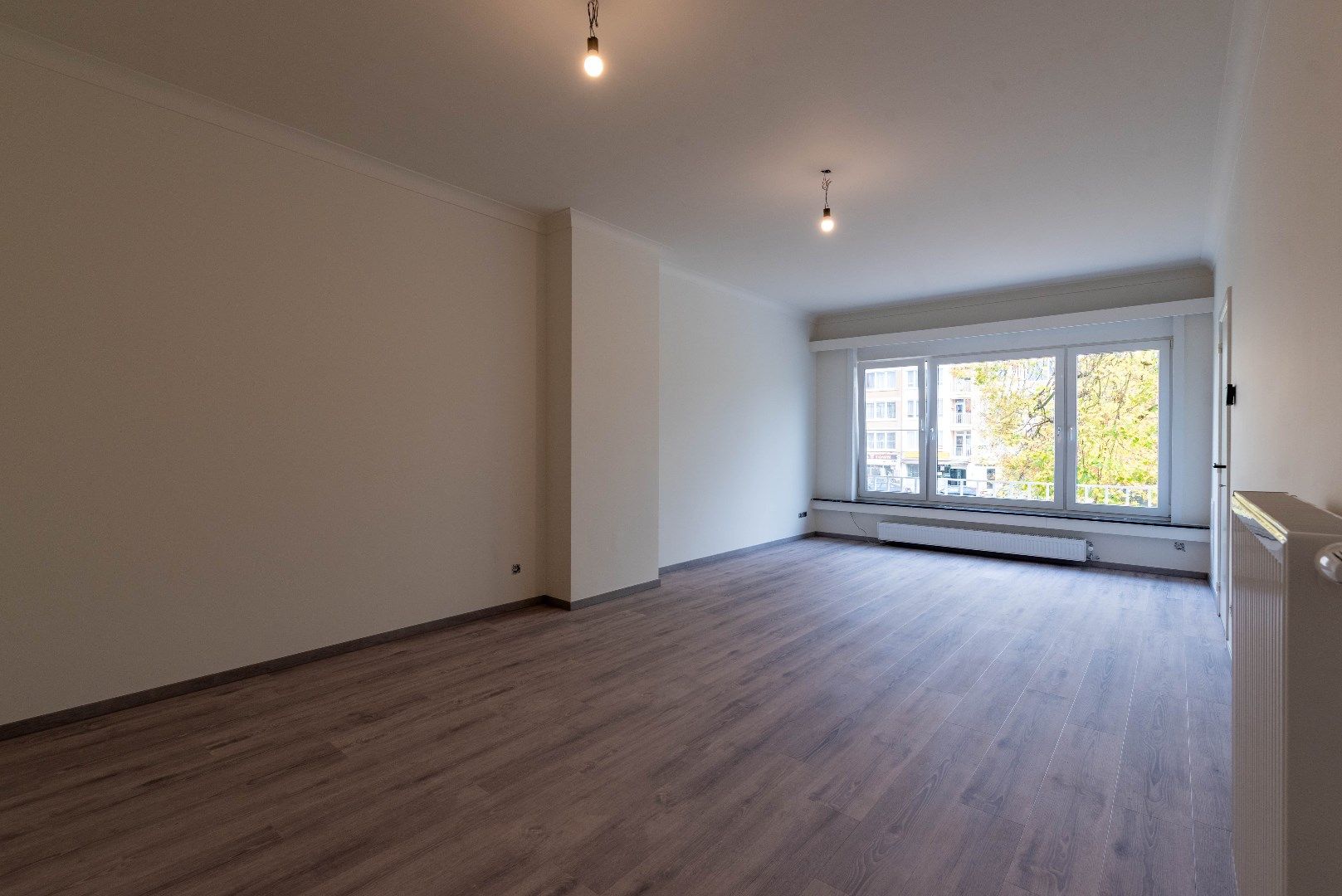 Opgefrist appartement met 2 slaapkamers foto 1