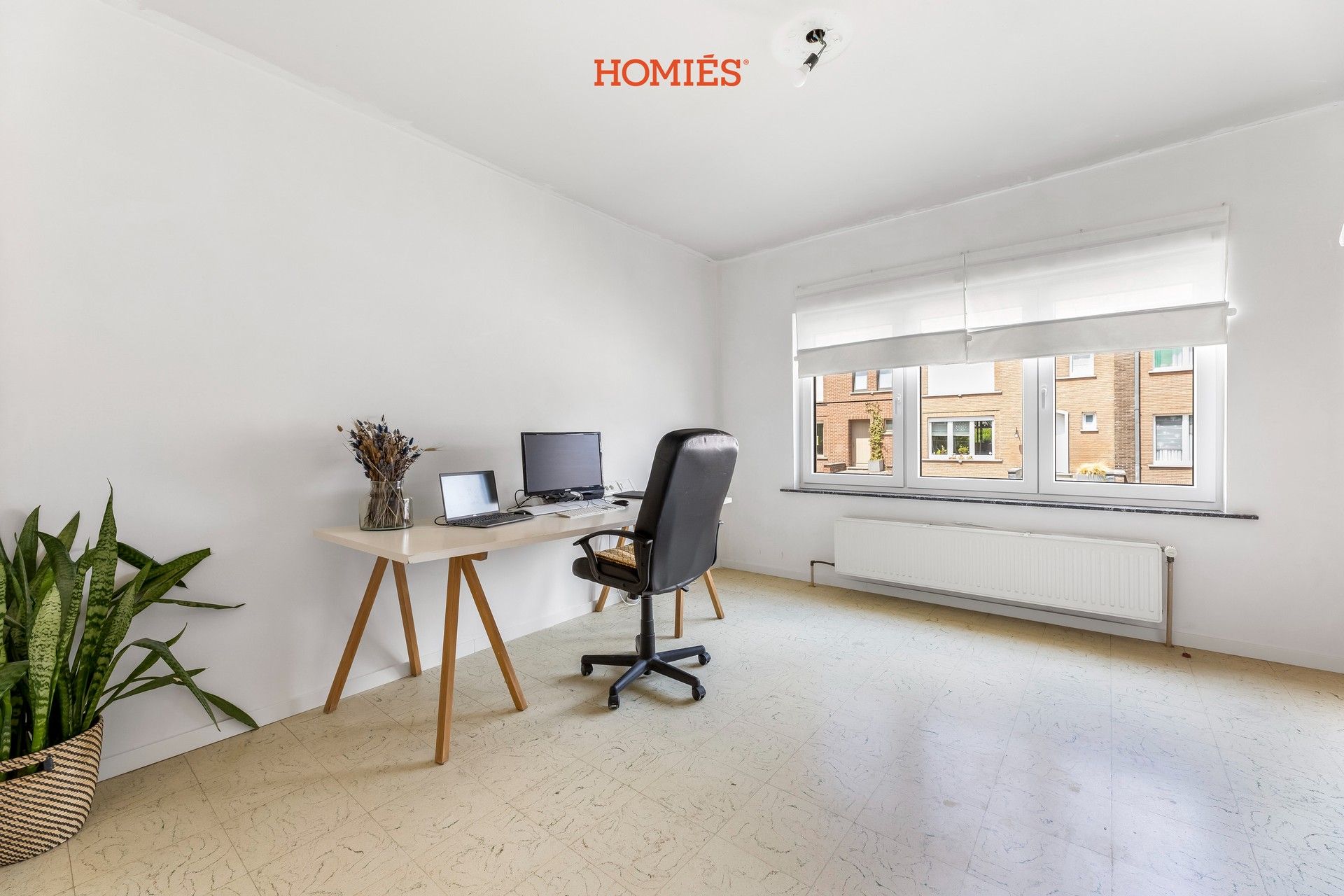 Ruime halfopen woning met tuin in Kessel-Lo foto 8