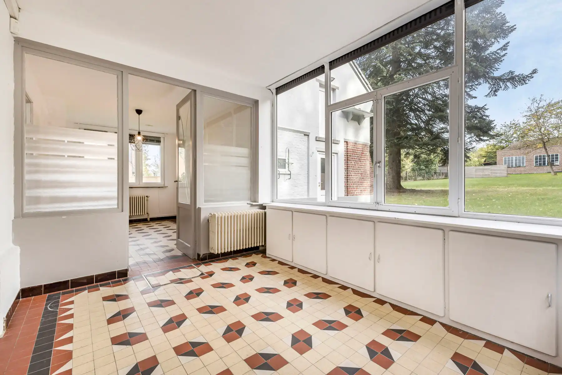 Karaktervolle herenwoning MET RUIM ATELIER en prachtige tuin foto 17