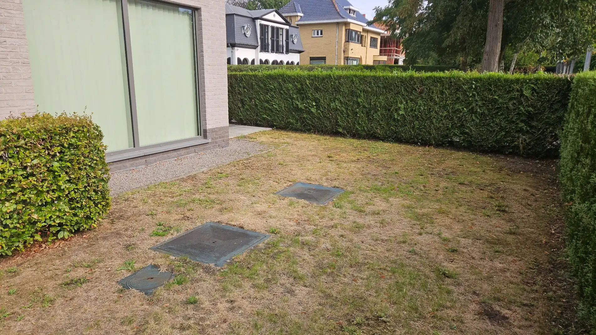 Ruim gelijkvloers app met 2 slk, terras, tuin en ondergrondse autostaanplaats foto 8