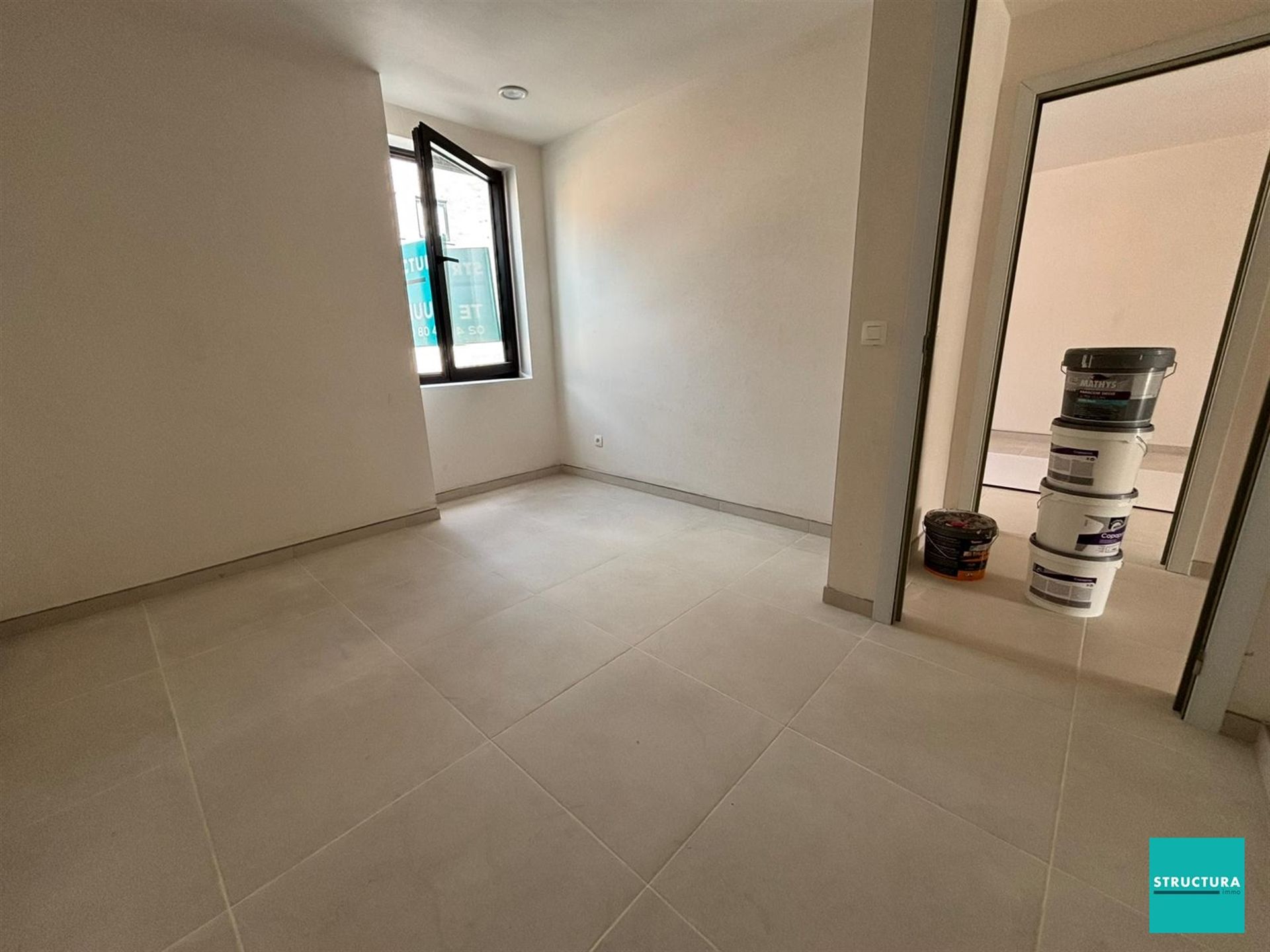 Appartement met 2 slaapkamers en 2 staanplaatsen in centrum Merchtem foto 7
