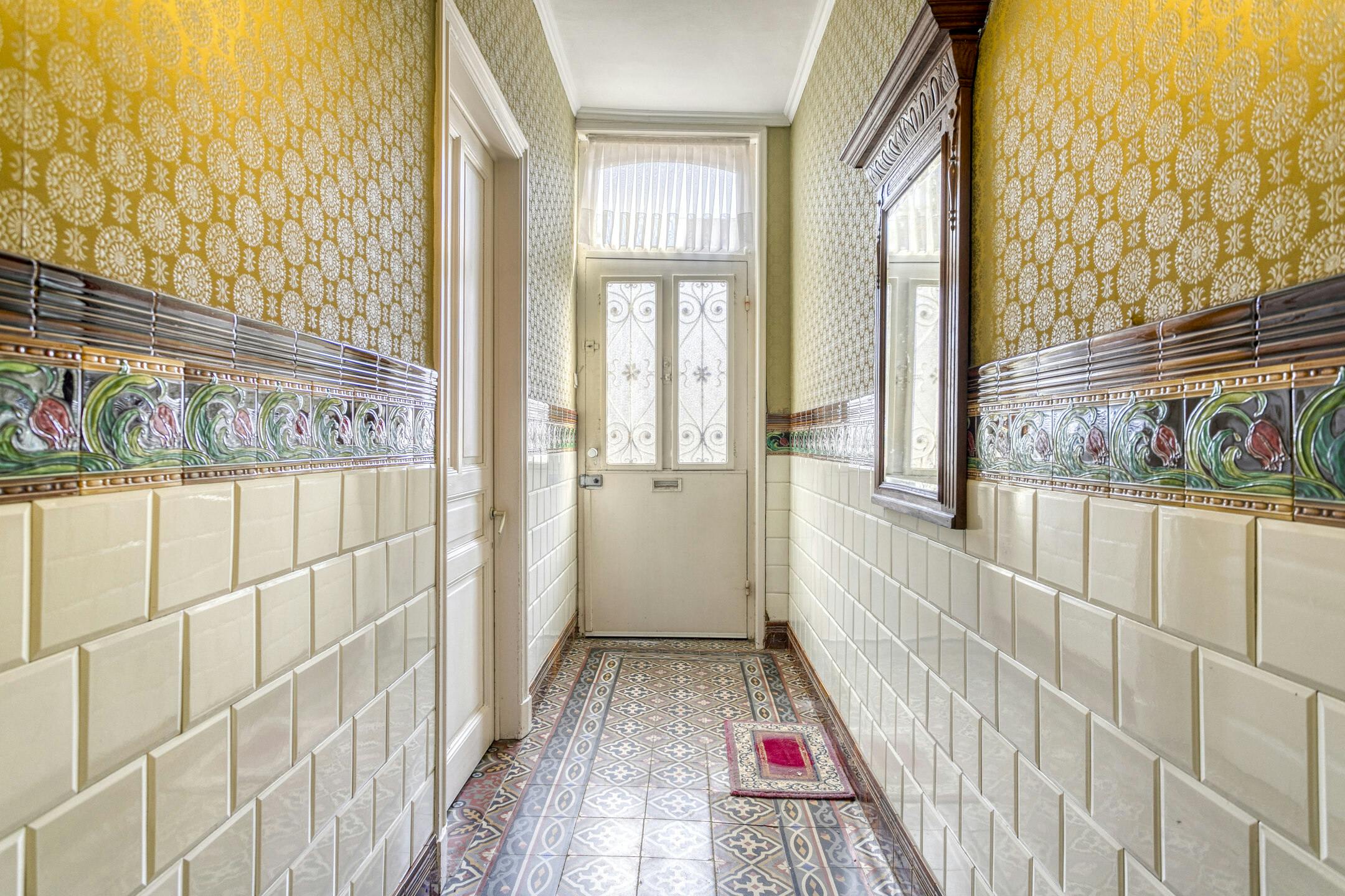 Karaktervol huis met zonnige tuin, 3 slaapkamers én garage met uitweg foto 3