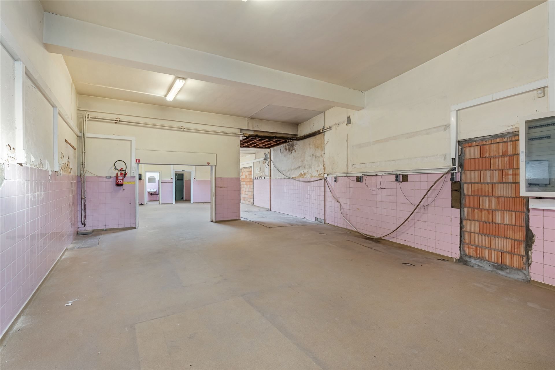 Woning met handelsgedeelte en opslagplaats. foto 20