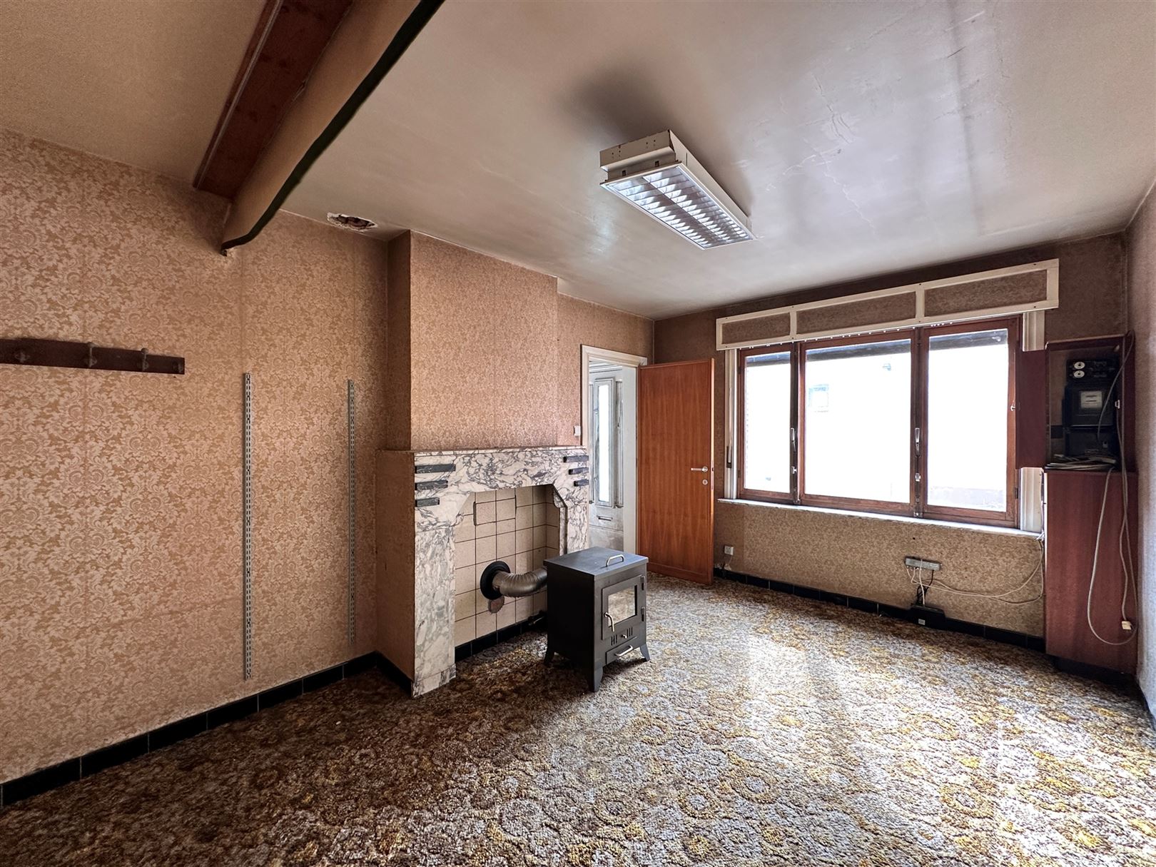 Te renoveren woning met potentieel gelegen in het landelijke Wichelen foto 4