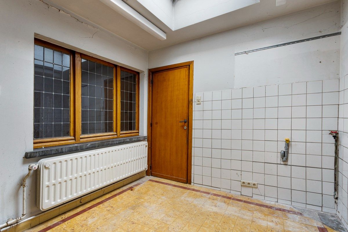 Grote woning in Tongeren centrum met ruimte voor burelen of praktijk foto 8