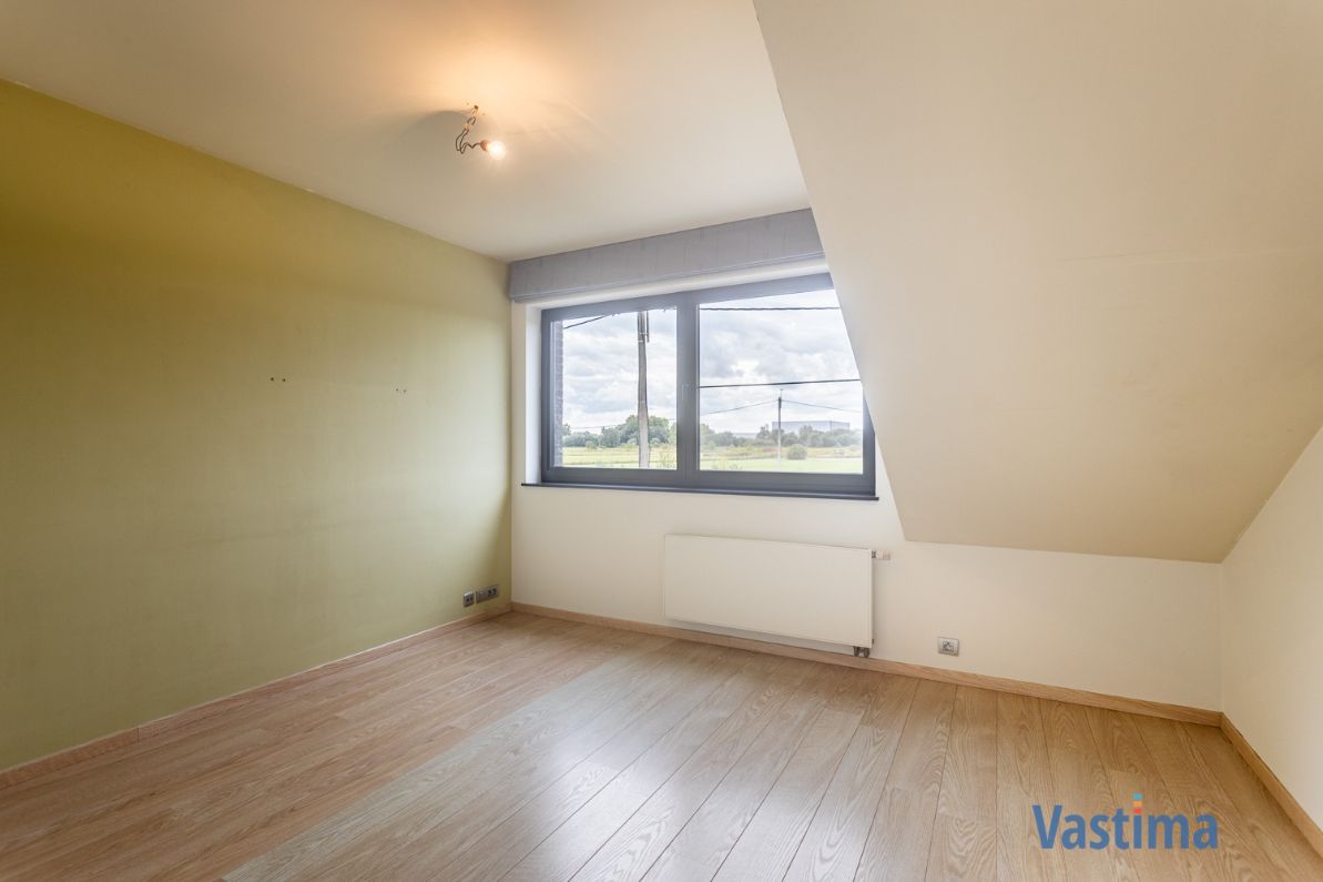 Ruime instapklare gezinswoning met zonnige tuin en garage foto 18