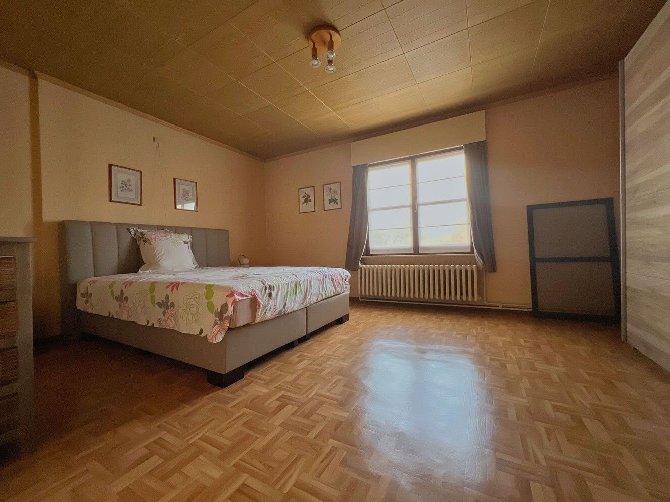 Topper! Stijlvolle woning met zonnige tuin + 2x garage foto 17