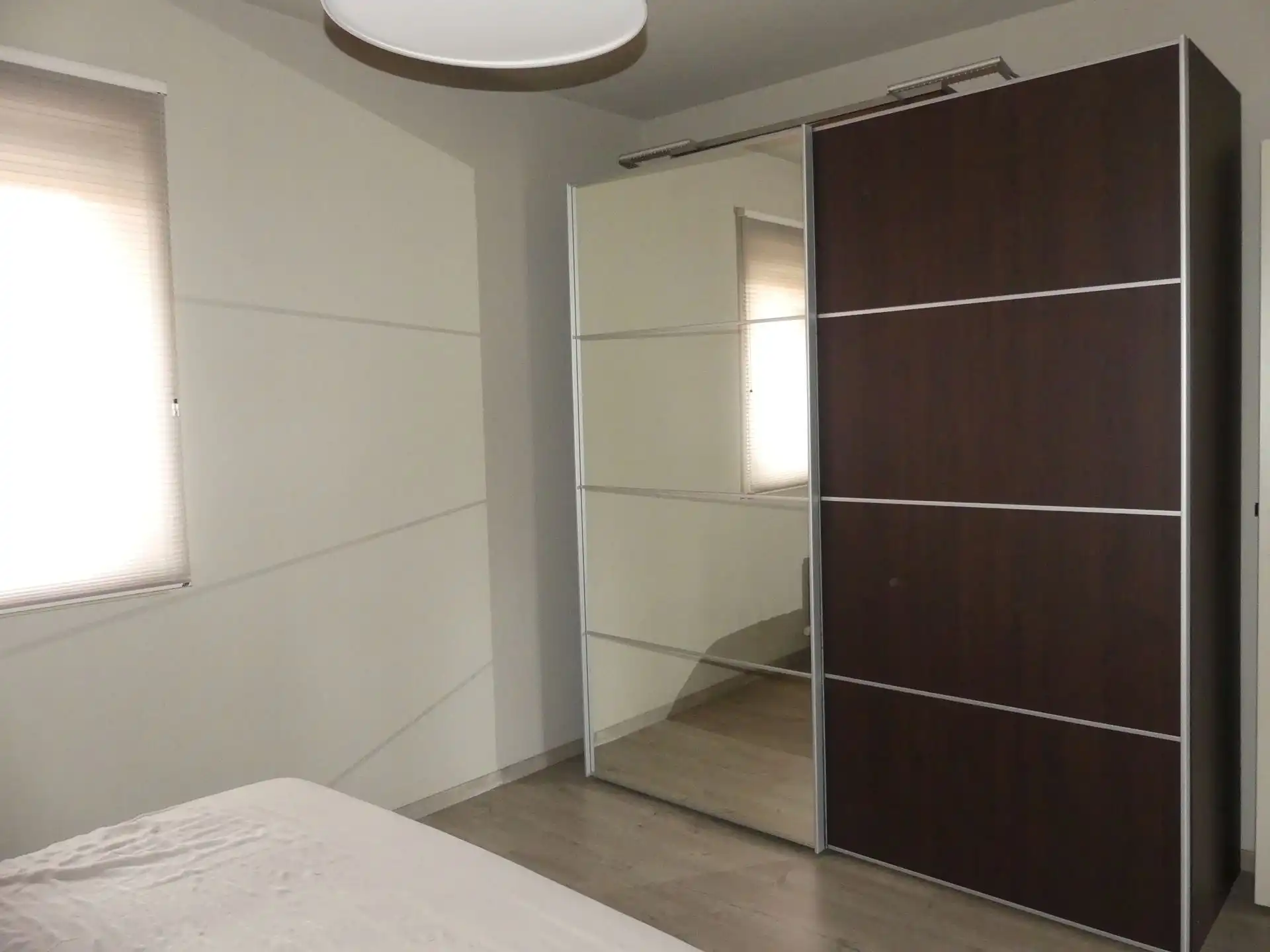 Instapklaar gelijkvloers appartement met zonnige tuin en uniek zicht op het water! foto 4