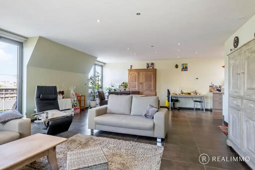 Luxueuze penthouse van 160 m² met 3 slaapkamers en parkting te Dottenijs! foto {{pictureIndex}}