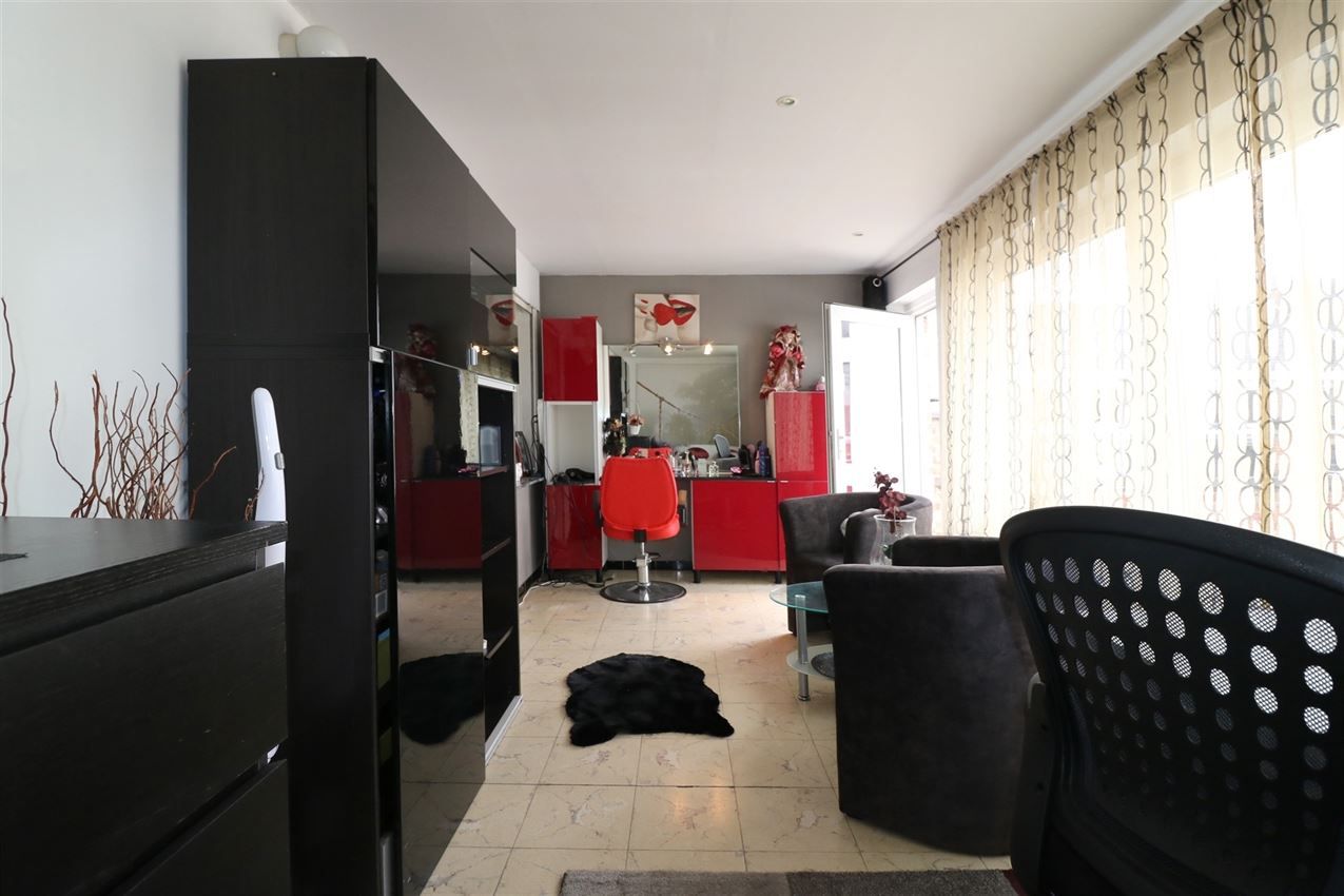 Opbrengsteigendom van 2 degelijke appartementen foto 60