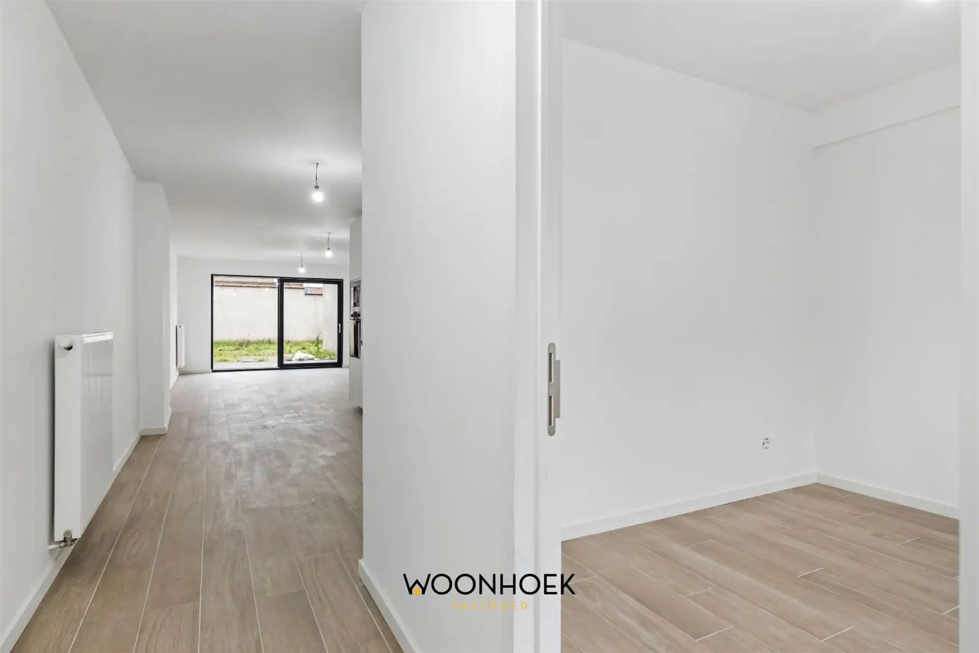 Gerenoveerde, 6-slpk woning, zonnige tuin en 2 bdkms te Sint-Niklaas! foto 11