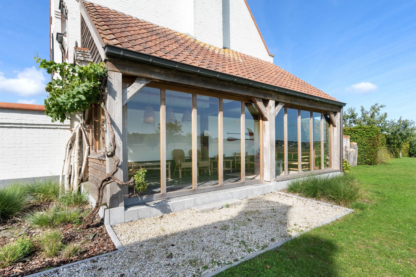 Hedendaagse villa gelegen op een terrein van 2.648m² genietend van open zicht over de Polders. foto 19