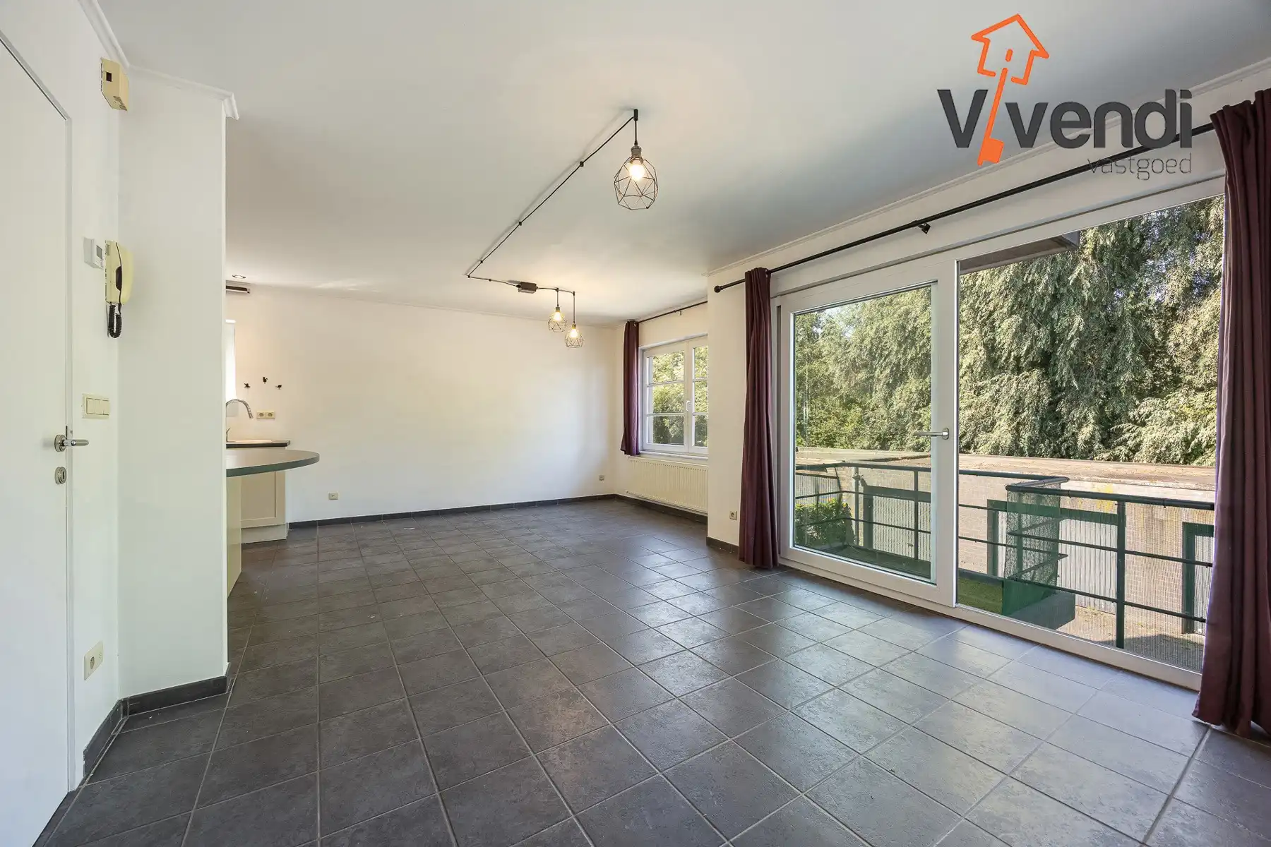 Ruime en lichtrijke duplex met 3 slpk inclusief 1 garagebox! foto 2