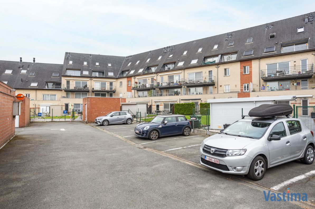 Instapklaar gelijkvloers appartement met tuin en garage foto 20