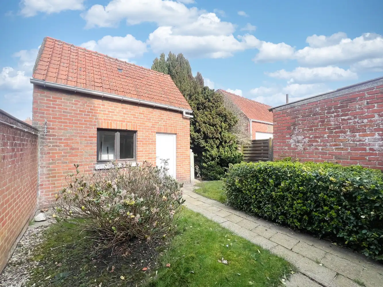 Karaktervolle gezinswoning met zonnige tuin + garage foto 13
