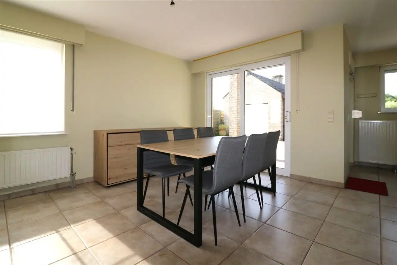 Gusting gelegen woning met 3 slp, garage en tuin foto 5