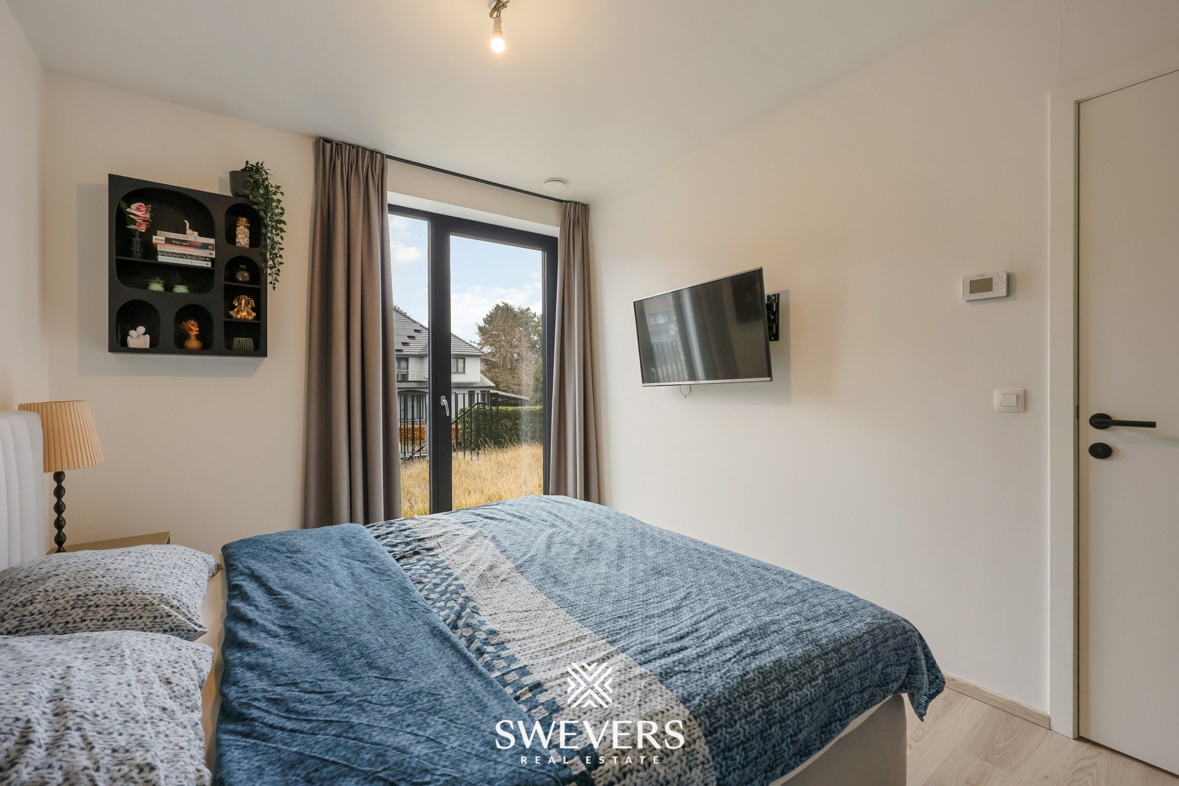 Gelijkvloers appartement met privétuin en dubbele garage foto 11