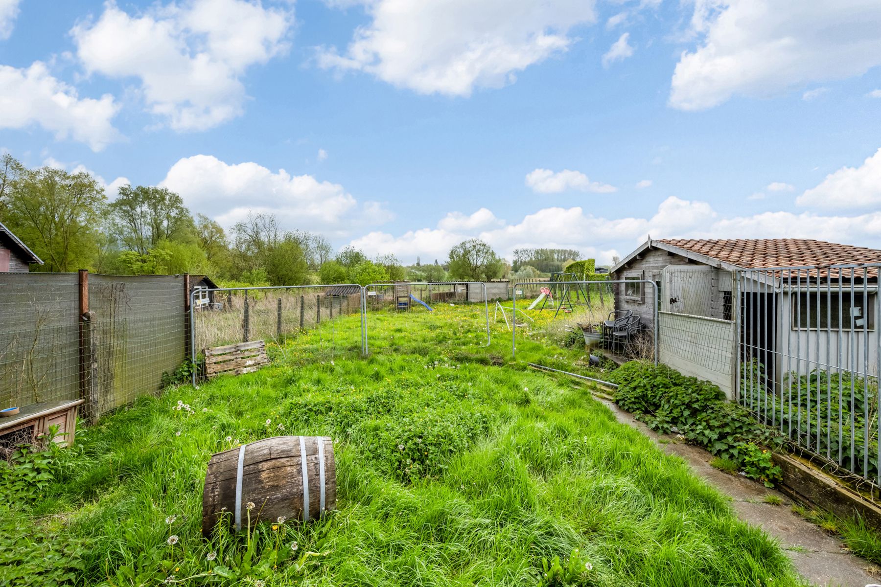 Gezinswoning met grote tuin en landelijk uitzicht! foto 25